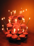 SX17137 Jen's cupcake birthday cakes with candles lit.jpg